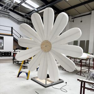 Louise Frost Multidisciplinary freelance maker and scenic creative with props, paint finishes:, floral and plant installations, set dressing, sign writing and calligraphy